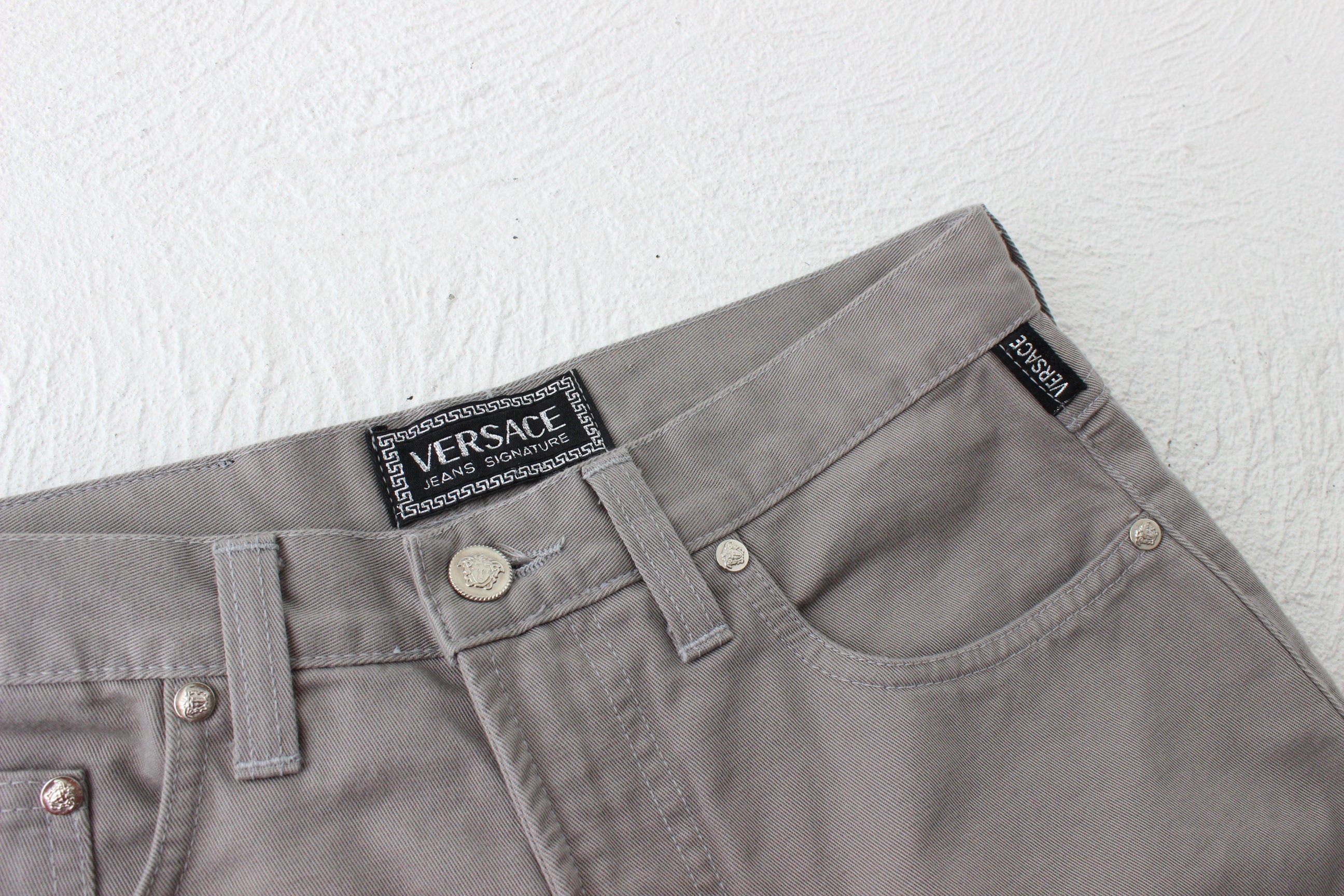 90s VERSACE Neutral Grey Jeans w/ Medusa Badge