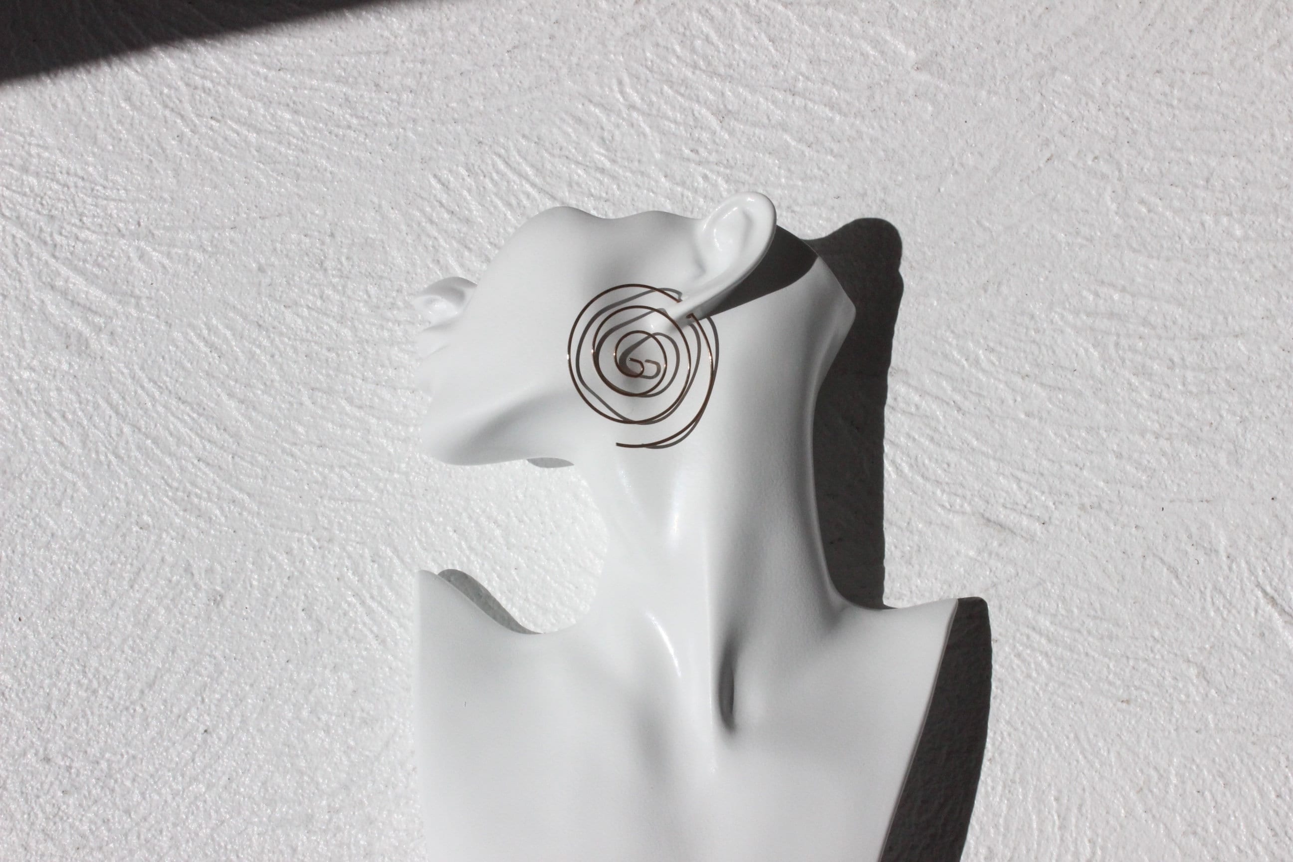 Single Gold Swirly Earring
