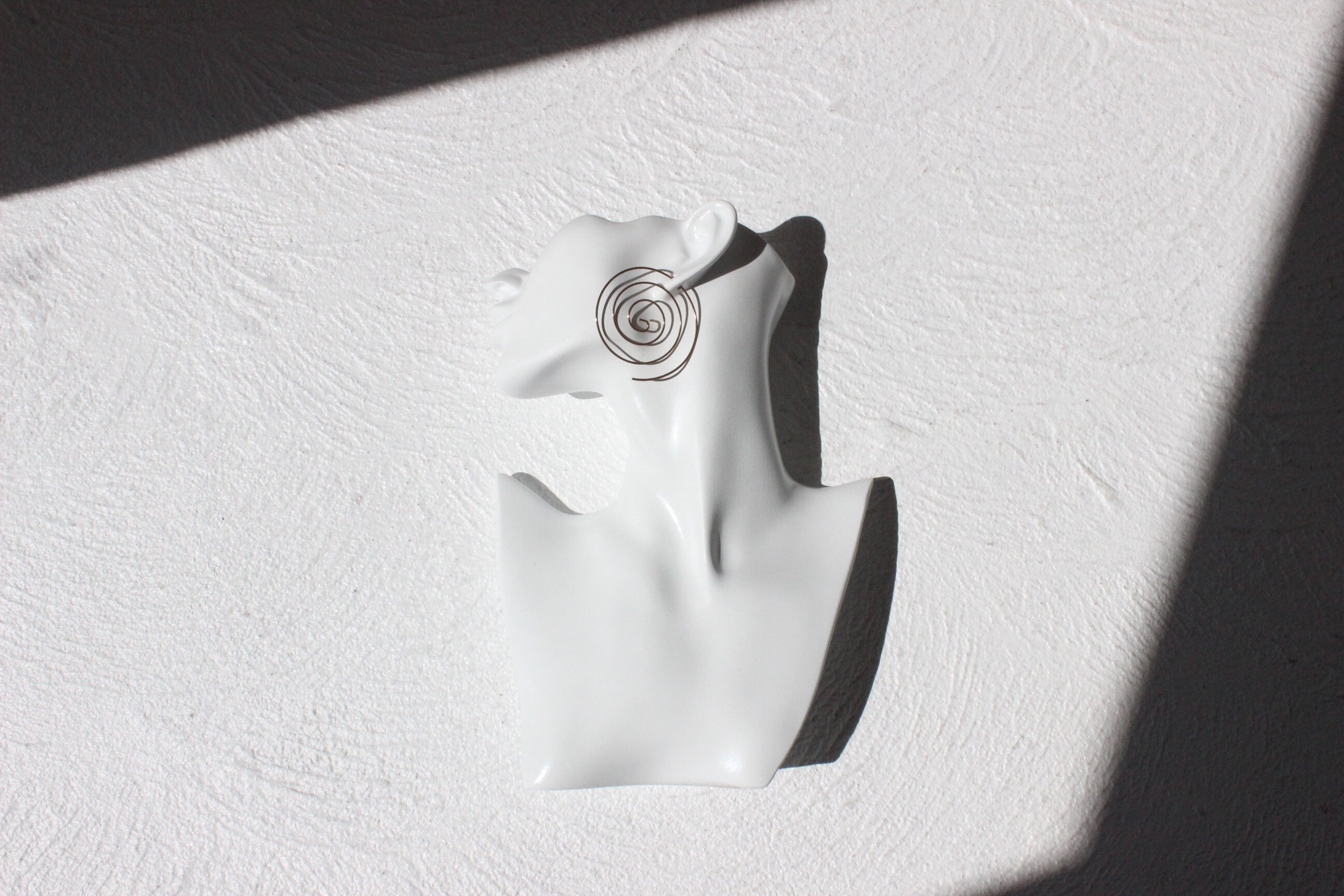 Single Gold Swirly Earring