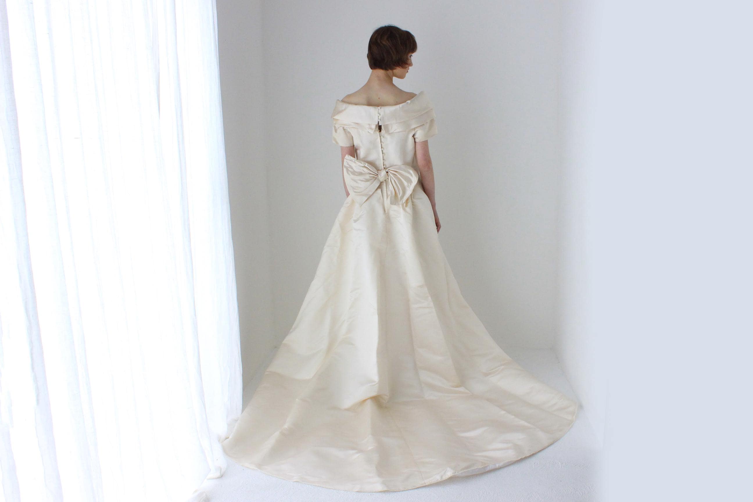 1990s Duchess Silk Off Shoulder Hourglass Wedding Gown w/ Back Bow + Detachable Train