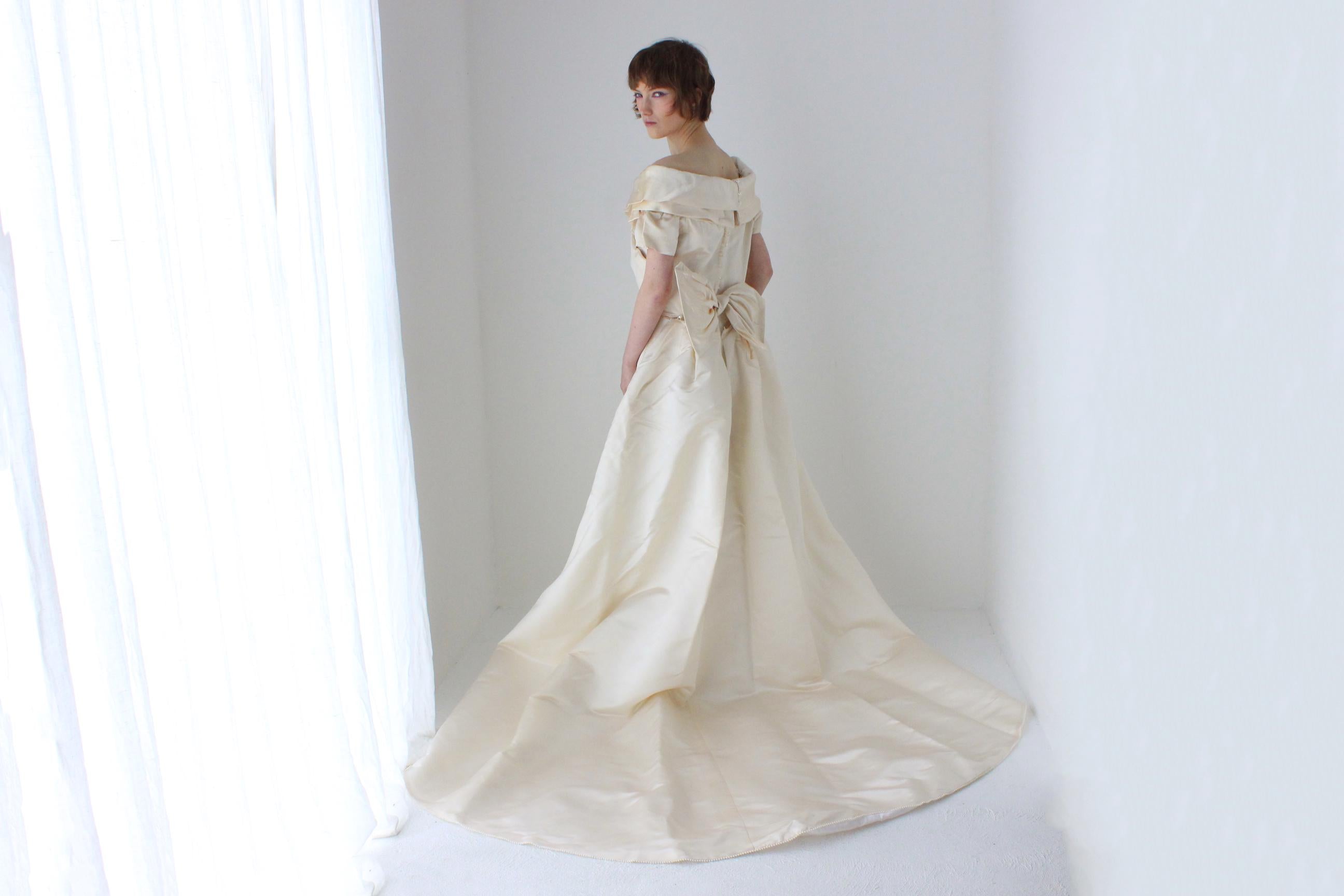 1990s Duchess Silk Off Shoulder Hourglass Wedding Gown w/ Back Bow + Detachable Train