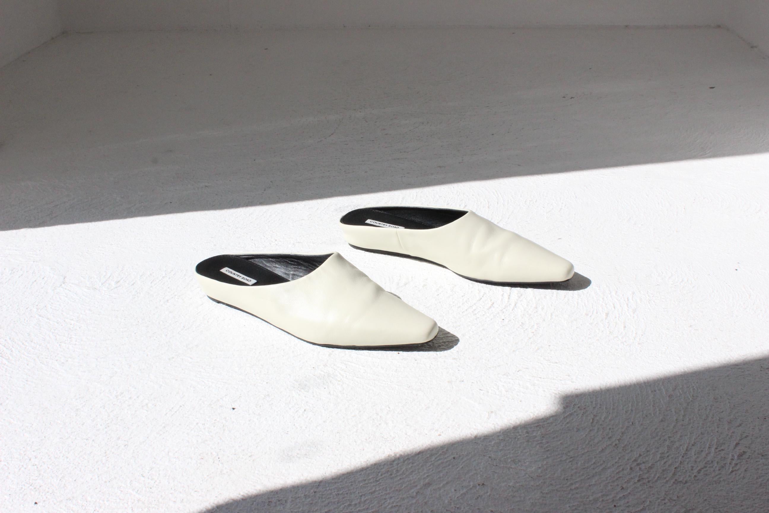 Contemporary Ecru Leather Slip Ons - Euro 40